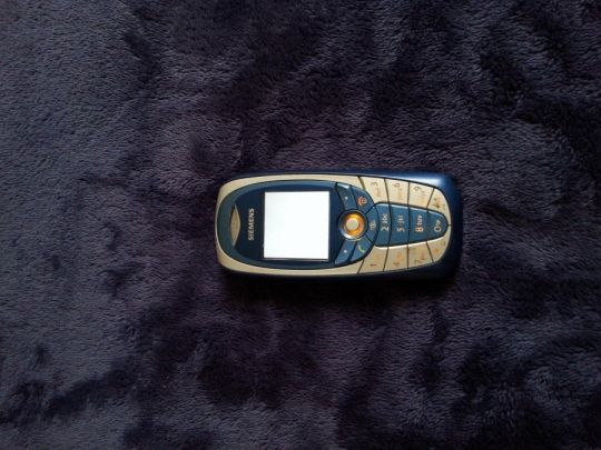 Siemens c65  eladó telefon fehéren világit