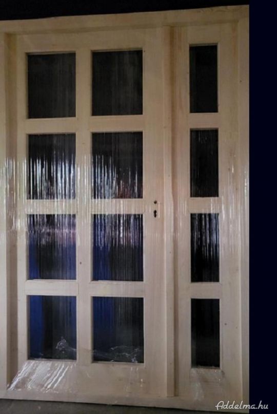 Vadonatúj bejárati ajtó 140x210es eladó.